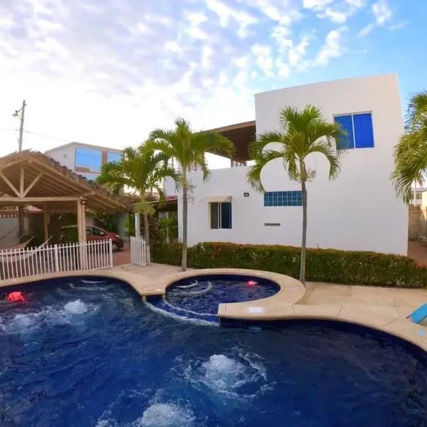 Casa con piscina y salida a la playa, מלון בData de Villamil