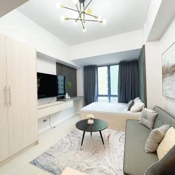 38 Park Avenue right in the heart of IT Park Cebu, 55 inches TV, wifi, מלון בTabok