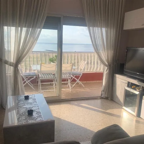 Apartamento en la playa, отель в городе Пуэбла-де-Фарнальс