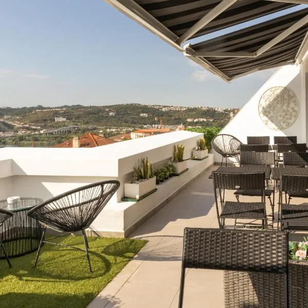 Penedo da Saudade Suites & Hostel, hotel v destinaci Coimbra