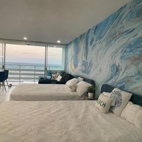Beautiful Ocean Blue Love oceanfront apartment, отель в городе Фахардо