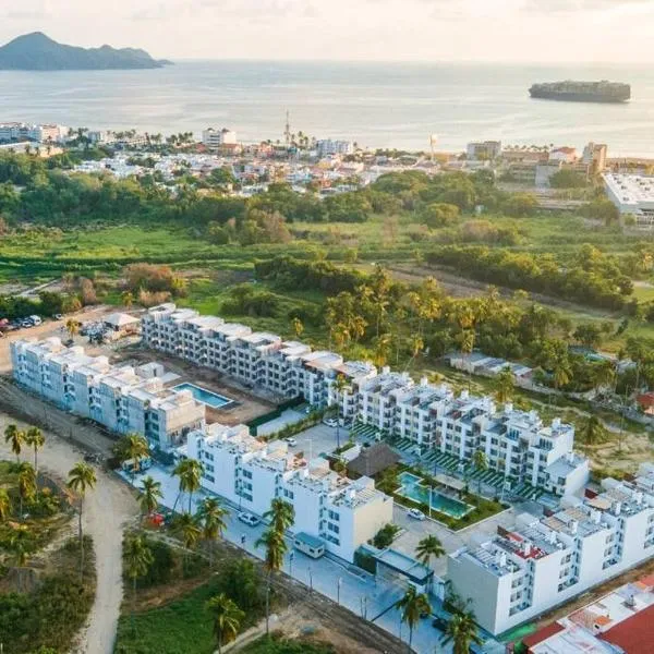 Acogedor apartamento con alberca โรงแรมในมานซานิโญ