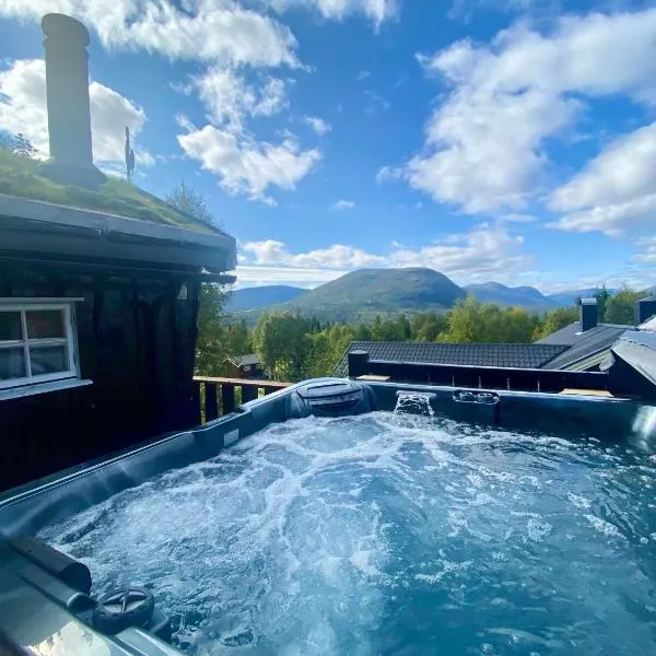 Three bedroom holiday house with jacuzzi in Bjorli , pets allowed, hotel in Bjorli