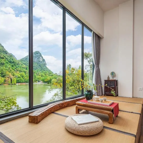 Guilin HeShe Lakeside Resort-Free pick up train station stay two nights, hotel din Guilin