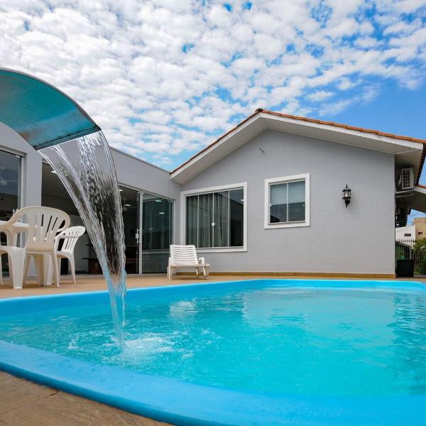 12 hóspedes - PISCINA tratamento com água salgada - Cozinha GOURMET - 4 QUARTOS - 3 BANHEIROS - GARAGEM - ESCRITORIO - 2,1 km do Cataratas JL Shopping - Foto 4