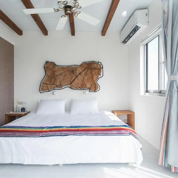 Tropical Low Boundary B&B, hotel v destinaci Donghe