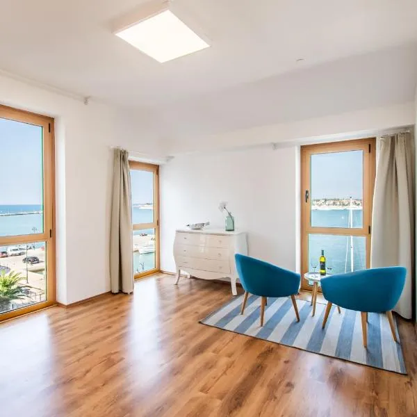 Umag seafront seaview center apartments old town 1,2,3,4 by Rentistra, hotel in Umag
