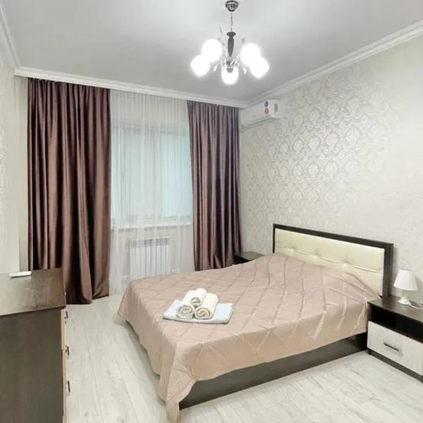 # 21 Солнечная и светлая квартира, hotel di Atyraū
