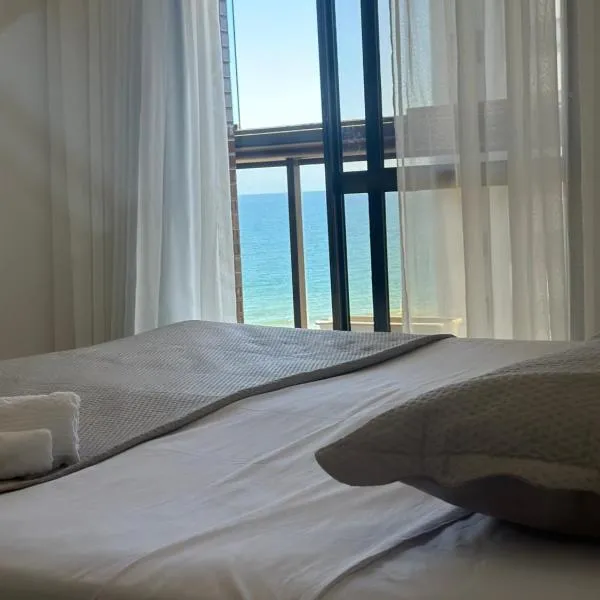 Surpreenda-se excelente apartamento com vista mar, hotel in Salvador