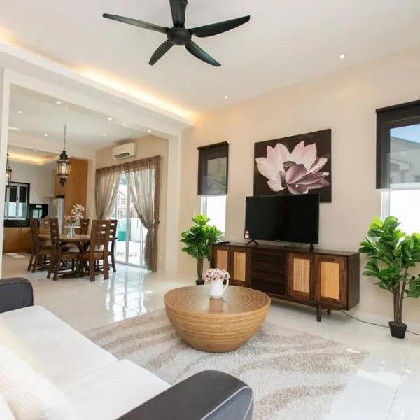 BalikPulau Cozy Home 4BR w BBQ, hotel v destinaci Balik Pulau