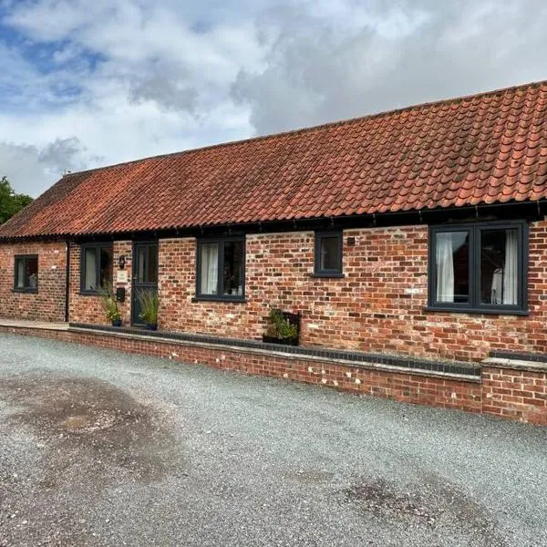 Barn conversion with hot tub, hotel in Wellingore