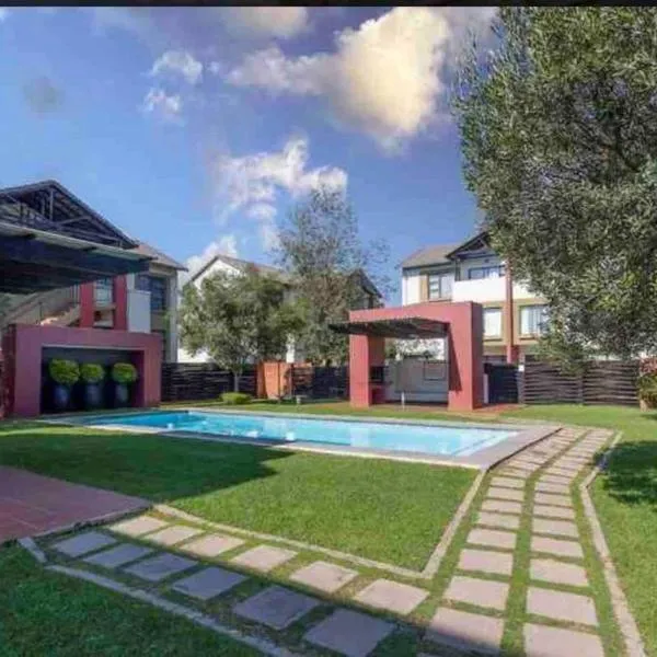 A Stunning Cozy Apartment, hotell sihtkohas Randjesfontein