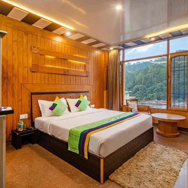 Treebo Trend Srishti Vaikunth With Mountain View, hotell i Jūnga