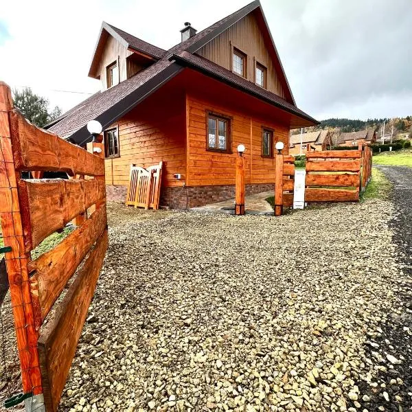 Highlander - drewniany dom w Beskidach, hotel in Kamesznica