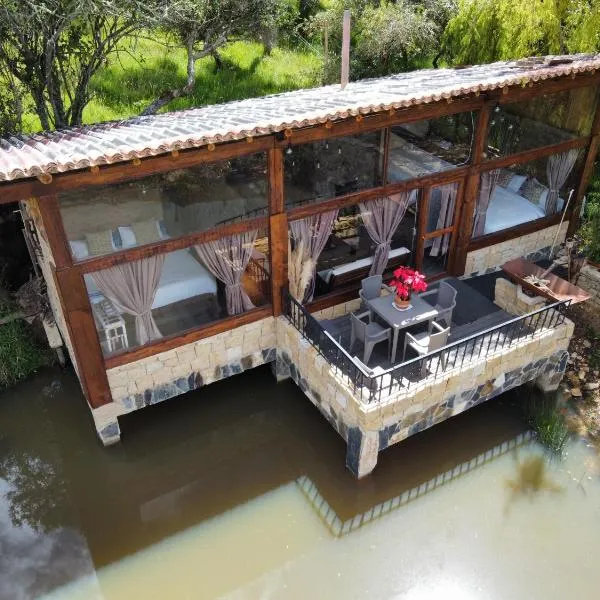 Cabaña Isla Dorada, hotel v destinaci Guatavita