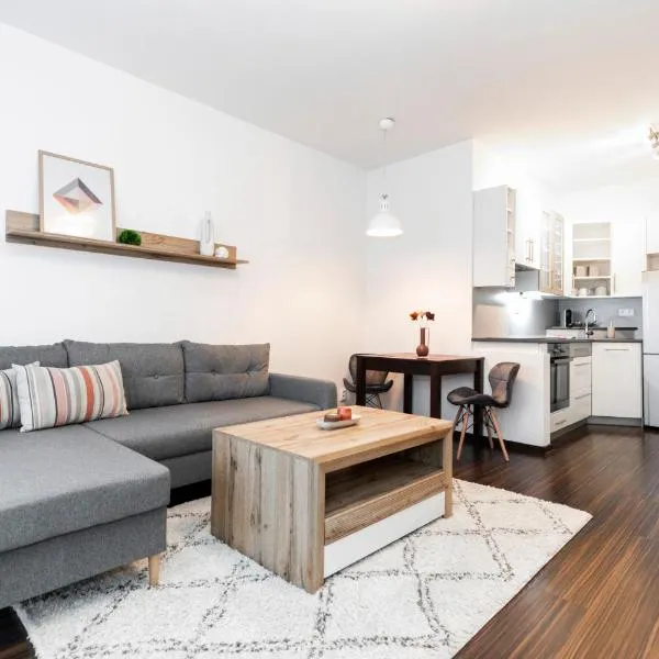 ALURE RESIDENCES 3 & 24h self check-in, parking in the garage in the apartment building included, new building, terrace, green location with a forest park with a lake, children's playground, hotel in Banská Bystrica