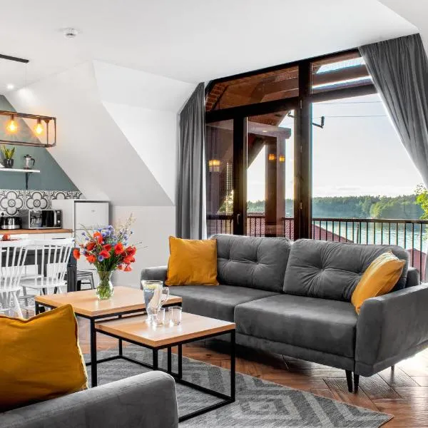 Apartamenty Pod Kominkiem, khách sạn ở Rydzewo