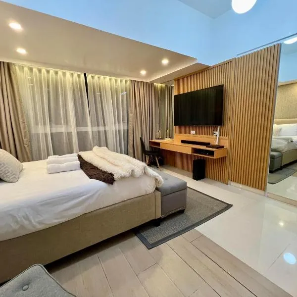 Hotel Vibe Condo at Uptown Parksuites BGC, hotel in Manila