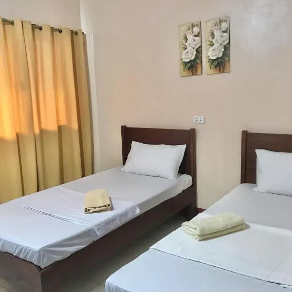 JBR Tourist Inn - Port Barton, hotel en Itaytay