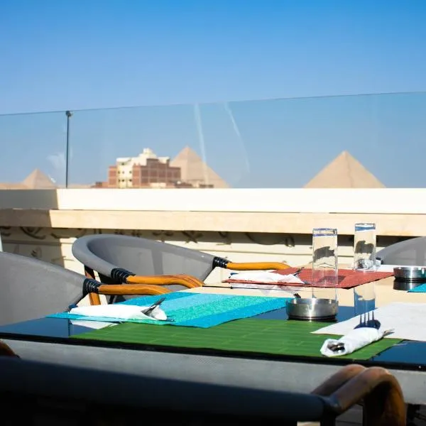 Pyramids Chillout Hotel، فندق في Al Qal‘ah