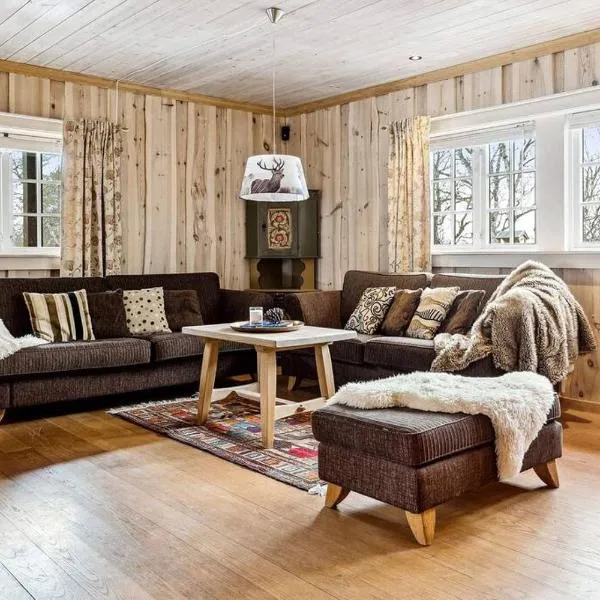 Koslig hytte ved Grimsdalen, hotel in Dovre