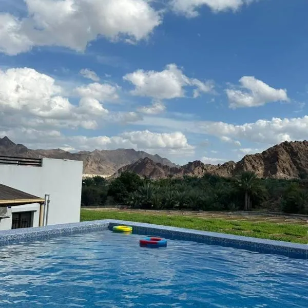 Alhara Lodge استراحة الحارة, hotel v destinaci Qimah