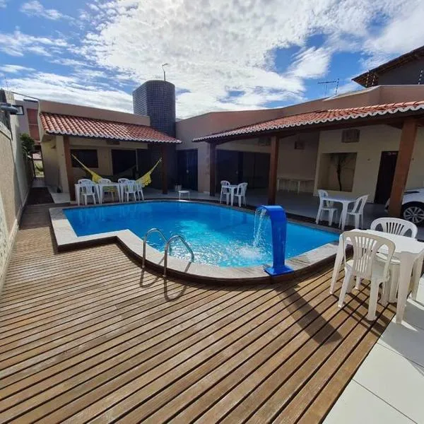 Casa agradável: piscina, churrasqueira e redário., hotel in Natal