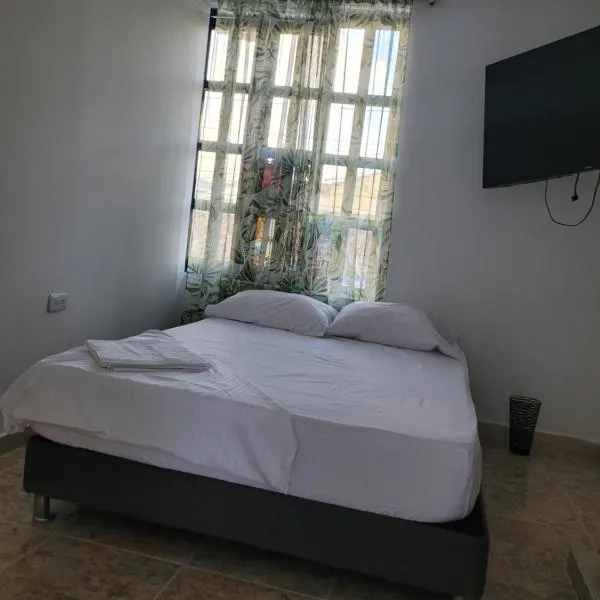 Apartamento cerca a la Basílica de Buga, hotel v destinaci Buga