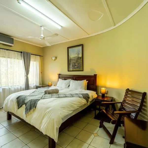 Room in Villa - Zambezi Family Lodge - Lion Room, hotel in Victoria Falls