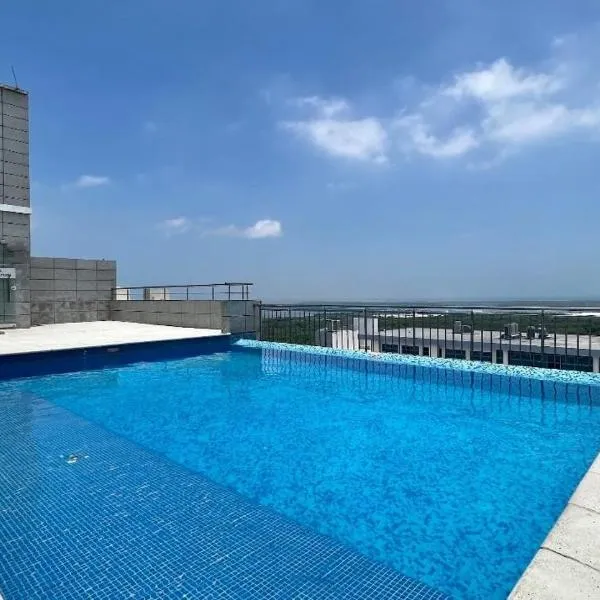 Luxury Apartamento Hilton WI-FI, TV, Piscina y Gym, hotel in Barranquilla