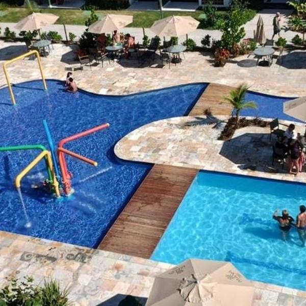 Flat com vista para piscina principal
