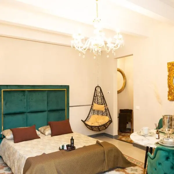 Femme noir Boutique Apartament Fitness e spa โรงแรมในกาแซร์ตา