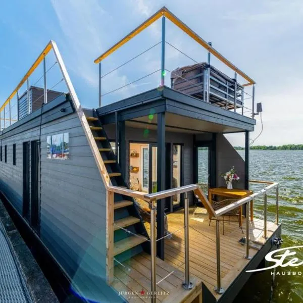 Hausboot Glücksmomente mit Dachterrasse in Schleswig am Ostseefjord Schlei, hotel v destinaci Šlesvik