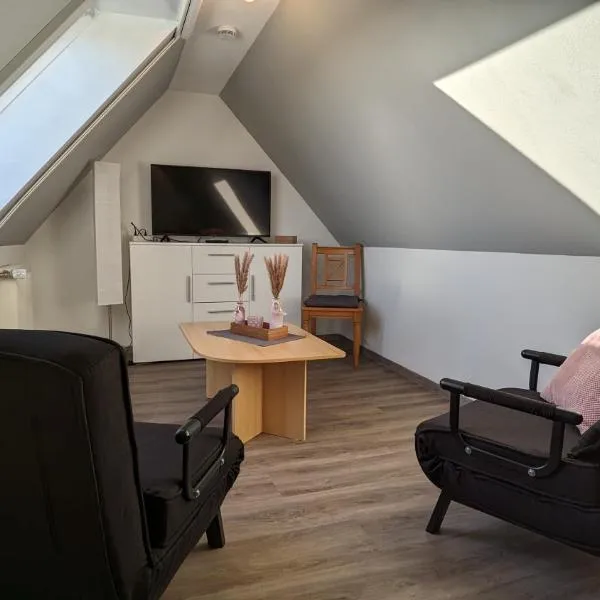 Dachgeschosswohnung Wilhelm, hotel in Nordleda