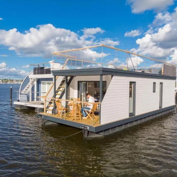 Hausboot Aegir mit Dachterrasse in Schleswig am Ostseefjord Schlei, hotel v destinaci Šlesvik