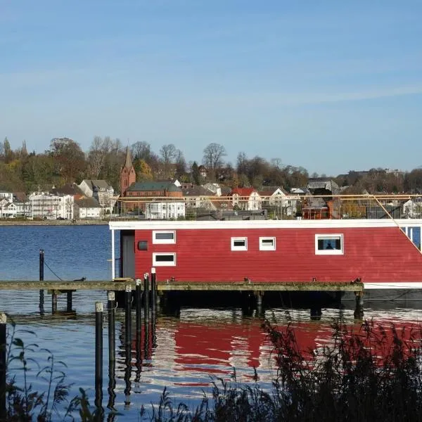 Hausboot Flying Dutchman (5*****) mit Dachterrasse in Schleswig am Ostseefjord Schlei, hotel v destinaci Šlesvik