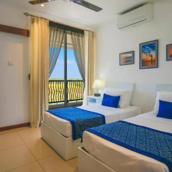 Oceanfront condo 3-2-01- Nilaveli, hotel en Nilaveli