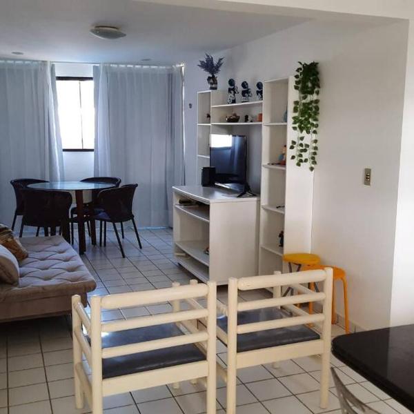 Apartamento azul no condomínio Mar de Cotovelo