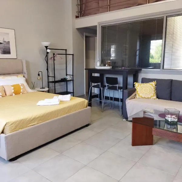 Cozy apartment near to the airport, hotel in Kouvarás