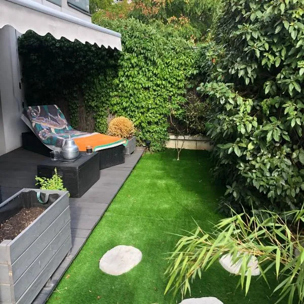 Appartement avec Jardin - La Plaine Saint Denis, hotel in Saint-Denis