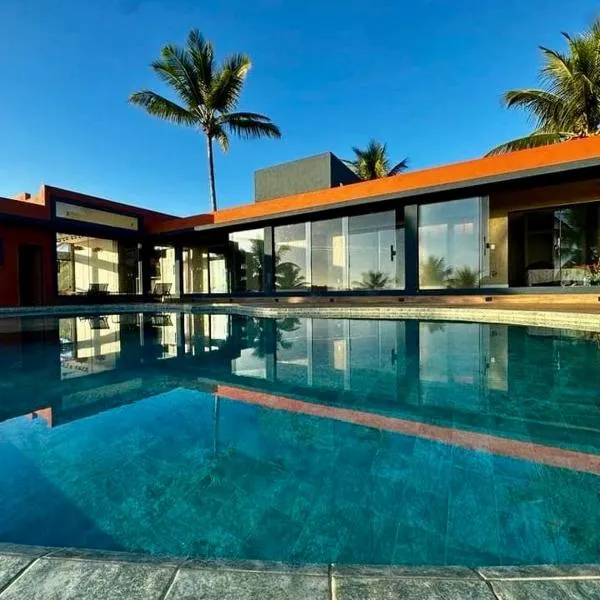 La Maison Loosaï -Σlégance-avec TV, hotel a Itacaré