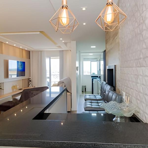 Apartamento com três quartos e ar-condicionado