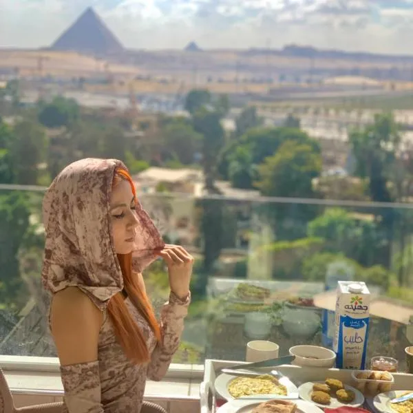 WOW Pyramids Inn With Rooftop Lounge, hotel v Káhiře