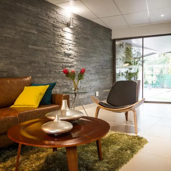 Palm Lodge Guest House, ξενοδοχείο στο Μπλουμφοντέιν