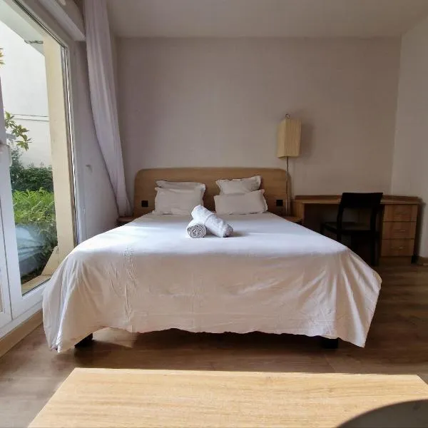 Appartement confortable - Proche du lac, hotel em Divonne-les-Bains