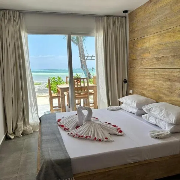 Beachfront White Pearl Suite ZanzibarHouses, hotel u gradu 'Gulioni'