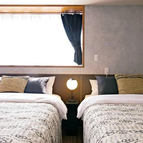 TOMMY CONDOMINIUM WAKASA402, hotel in Kume