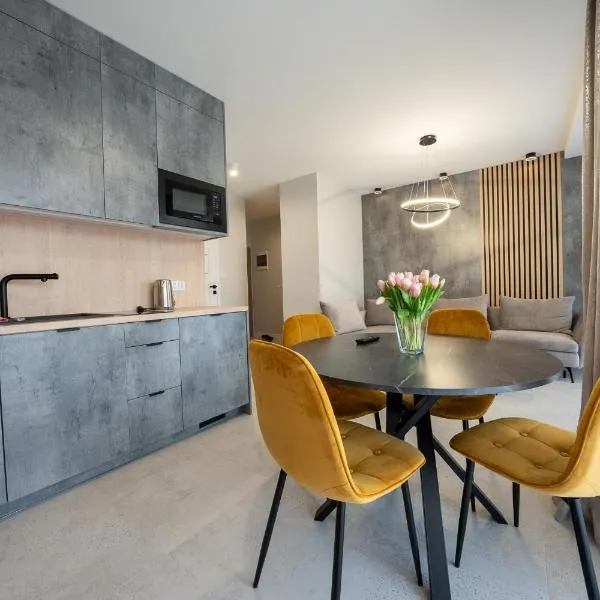 Apartament z Tarasem Morska 6 Rewal 50m do morza, hotel v destinaci Rewal