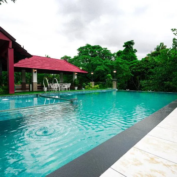 Athirappilly Rainland Resort, hotel v destinácii Thattakād