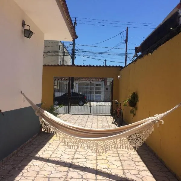 Casa perto da praia com piscina e área de churrasqueira โรงแรมในปรายากรันเด